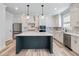 Beautiful kitchen with a center island, stainless steel appliances, and pendant lighting at 4035 Hosch Retreat Dr, Buford, GA 30519