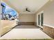 Covered patio with a ceiling fan, ideal for outdoor entertaining at 4035 Hosch Retreat Dr, Buford, GA 30519