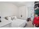 Cozy bedroom featuring carpet and a small walk-in closet at 7554 Roseberry Way, Lithonia, GA 30038