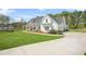 Spacious home on a large lot with a long driveway and well-maintained landscaping at 20 Tuscany Dr, Mansfield, GA 30055