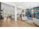 Bright and airy living room featuring hardwood floors, fireplace, and custom built-ins at 20 Tuscany Dr, Mansfield, GA 30055