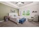 Comfortable main bedroom with a large window, tray ceiling, and neutral decor at 20 Tuscany Dr, Mansfield, GA 30055