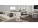 Comfortable living space with a neutral color palette and an adjacent dining area at 206 Silverton Dr, Dacula, GA 30019