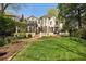 Expansive backyard featuring a well-manicured lawn and beautiful landscaping at 41 Palisades Ne Rd, Atlanta, GA 30309