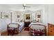 Charming bedroom with twin beds, patterned wallpaper, and plenty of natural light at 41 Palisades Ne Rd, Atlanta, GA 30309
