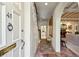 Inviting foyer with brick flooring, arched entry, and view into the living area at 41 Palisades Ne Rd, Atlanta, GA 30309
