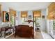 Comfortable main bedroom with wood floors, four-poster bed, and sun-filtering window shades at 41 Palisades Ne Rd, Atlanta, GA 30309