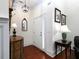 Charming foyer features hardwood floors, a decorative mirror, and sconces creating a welcoming entryway at 4845 Josie Way, Acworth, GA 30101