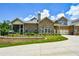 Well-maintained brick home features a spacious driveway, two-car garage, and a beautifully landscaped front yard at 4845 Josie Way, Acworth, GA 30101