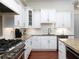 Beautiful kitchen featuring white cabinets, granite countertops, stainless steel appliances, and hardwood floors at 4845 Josie Way, Acworth, GA 30101