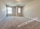 Bedroom with carpet, bright windows at 1367 Fern Ridge Ct # 31, Norcross, GA 30093