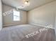 Bedroom with carpet and window at 1367 Fern Ridge Ct # 31, Norcross, GA 30093