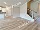 Bright and spacious living room with wood-look flooring and plenty of natural light at 1367 Fern Ridge Ct # 31, Norcross, GA 30093
