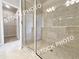 Modern tiled shower with glass door and walk-in closet at 1367 Fern Ridge Ct # 31, Norcross, GA 30093
