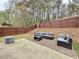 Back patio area with outdoor seating, perfect for entertaining and enjoying the backyard at 2168 Berryhill Se Cir, Smyrna, GA 30082