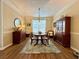 Dining room featuring a round table, stylish furnishings, and lots of natural light from a large window at 2168 Berryhill Se Cir, Smyrna, GA 30082