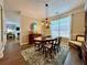 Elegant dining room with a modern chandelier, a round table, and large windows for natural light at 2168 Berryhill Se Cir, Smyrna, GA 30082