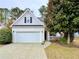Charming single-Gathering home with a brick facade, two-car garage, and well-maintained front yard at 2168 Berryhill Se Cir, Smyrna, GA 30082
