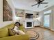 Cozy living room with fireplace, stylish decor and natural light from the sliding glass door at 2168 Berryhill Se Cir, Smyrna, GA 30082