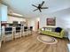 Open concept living space featuring kitchen island with barstool seating and comfortable living room at 2168 Berryhill Se Cir, Smyrna, GA 30082