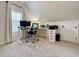 Bright home office featuring neutral paint, plush carpet flooring, and a large window for natural light at 2168 Berryhill Se Cir, Smyrna, GA 30082