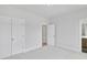 Bedroom features neutral carpeting, a closet, and is connected to a modern bathroom at 2637 Camphor Se Xing # 83, Smyrna, GA 30080