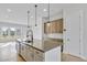 Kitchen featuring a large center island with pendant lighting and stainless steel appliances at 2637 Camphor Se Xing # 83, Smyrna, GA 30080