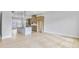 Open-concept kitchen featuring an island, modern light fixtures, and natural wood-colored cabinetry at 2637 Camphor Se Xing # 83, Smyrna, GA 30080