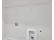 Bright laundry room features a white wire shelf for easy storage at 2637 Camphor Se Xing # 83, Smyrna, GA 30080