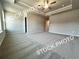 A Primary bedroom with a ceiling fan, recessed lighting, and large windows at 1397 Fern Ridge Ct # 34, Norcross, GA 30093
