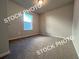Bedroom with a large window that lets in plenty of natural light at 1397 Fern Ridge Ct # 34, Norcross, GA 30093