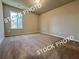Neutral bedroom with carpet, a window, and ample space at 1397 Fern Ridge Ct # 34, Norcross, GA 30093