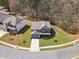 Stunning aerial view of a modern home featuring a well-manicured lawn and charming architectural details at 2096 Hamilton Lake Pkwy, Buford, GA 30519