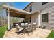 Back patio with a ceiling fan, dining area, and outdoor seating at 2096 Hamilton Lake Pkwy, Buford, GA 30519