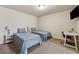 Bedroom with two twin beds, a desk, a comfortable chair, and neutral carpet at 2096 Hamilton Lake Pkwy, Buford, GA 30519