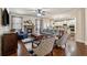 Inviting living room with a stone fireplace, hardwood floors, and an open layout to the kitchen at 2096 Hamilton Lake Pkwy, Buford, GA 30519