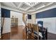 Sophisticated home office featuring coffered ceilings, hardwood floors, and wainscoting detail at 2096 Hamilton Lake Pkwy, Buford, GA 30519