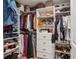 Organized walk-in closet with shelving for clothing and accessories at 2096 Hamilton Lake Pkwy, Buford, GA 30519