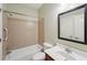 Full bathroom with shower-tub combination, neutral tile, and a vanity at 5615 Toccoa Dr, Douglasville, GA 30135