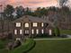 Stunning brick home with manicured landscaping and a welcoming entrance at 5615 Toccoa Dr, Douglasville, GA 30135