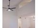 Bright, open living room features soaring ceilings, modern fan fixture and large windows providing lots of natural light at 606 Se Riverview Dr # 606, Marietta, GA 30067