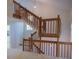Attractive wooden staircase with white risers and open landing showcases architectural detail at 606 Se Riverview Dr # 606, Marietta, GA 30067