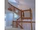 Inviting staircase with wooden railings leads to the upper level, enhancing the home's charm at 606 Se Riverview Dr # 606, Marietta, GA 30067