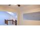Second story view of railing and stairwell with fan and skylight at 606 Se Riverview Dr # 606, Marietta, GA 30067