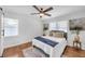 Bright bedroom with hardwood floors, natural light, and neutral decor at 814 Bank St, Smyrna, GA 30080