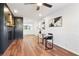 Bright, open-concept living room featuring desk and fireplace at 814 Bank St, Smyrna, GA 30080