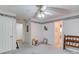 This bedroom features a closet and adjoins another room or bathroom at 1564 Beaver Creek Lane, Snellville, GA 30078