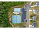 An aerial view of a community featuring a pool, tennis courts, playground, parking and homes at 4625 Thermal Ct, Douglasville, GA 30135