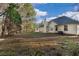 Spacious backyard featuring a well-maintained lawn and partial privacy, perfect for outdoor enjoyment at 4625 Thermal Ct, Douglasville, GA 30135