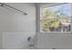 Bathroom view showing soaking tub and window at 4625 Thermal Ct, Douglasville, GA 30135